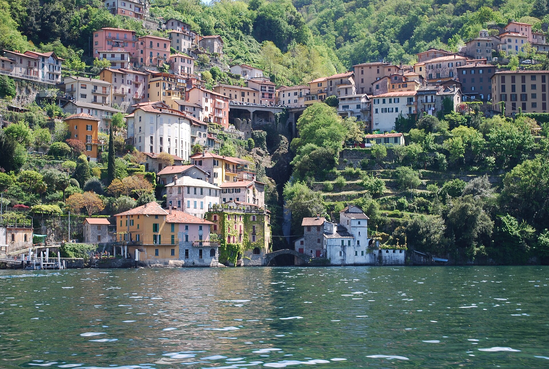 The tall stone houses of Nesso rising straight from the water on Lake Como