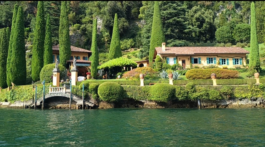 Lakeside villa and manicured gardens along the shore of Lake Como