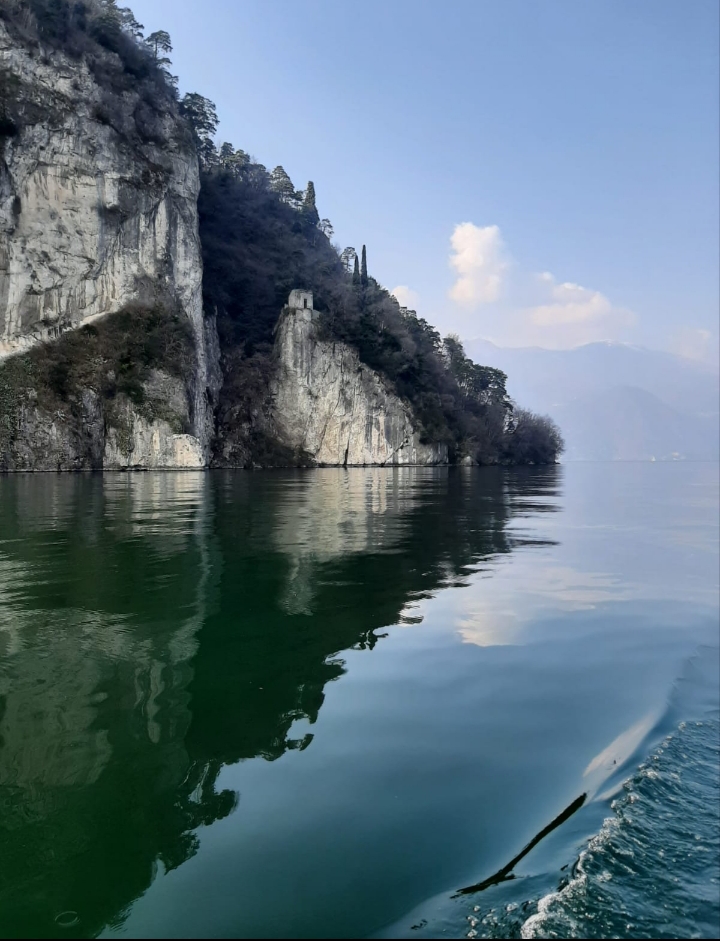 Calm waters of Lake Como at golden hour, seen from the Cooper 800